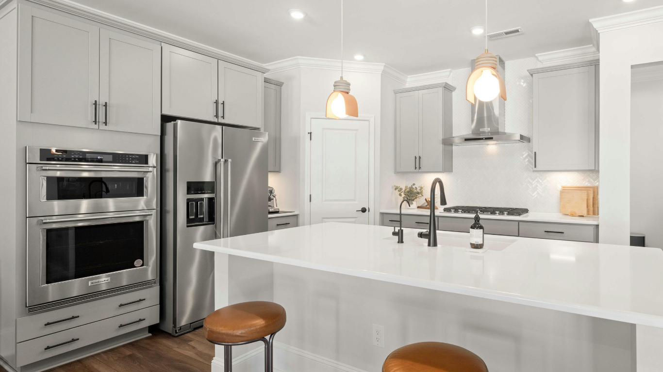 Blackstone Build Co. completed modern kitchen remodel featuring custom cabinetry and premium finishes